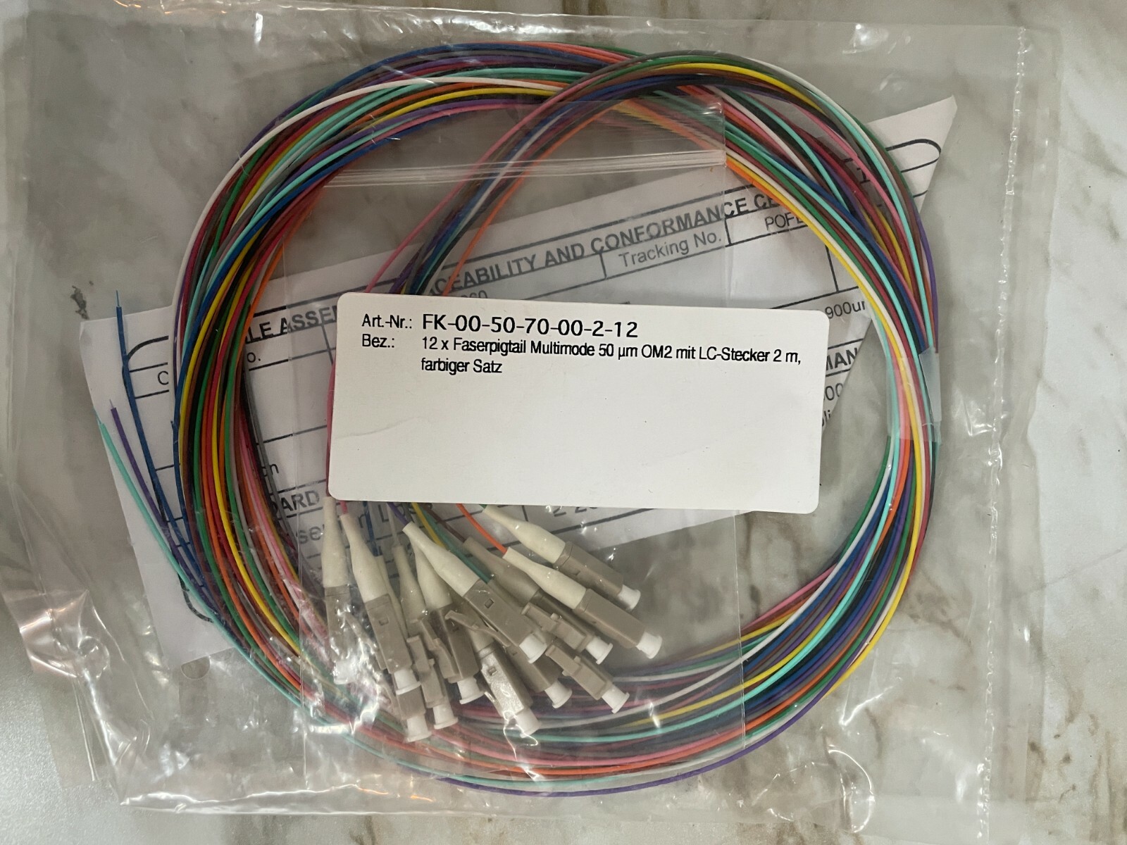 12 Optic Fiber Pigtail, Color-Coded, MMF OM2, LC/UPC, 900um, 2 Meter, Unjacketed
