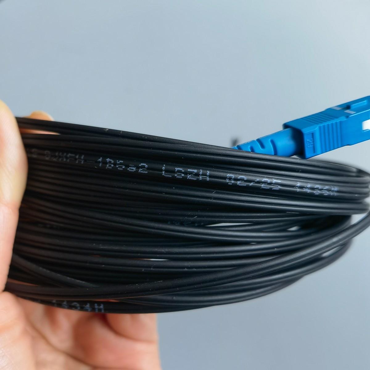 10M-50M Indoor Fiber Optic Drop Cable Single-Core Black SC/APC To SC/UPC