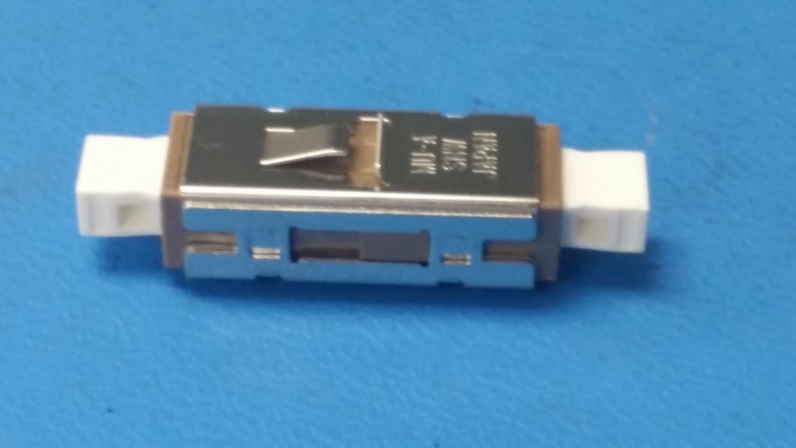 MU,SIMPLEX,ADAPTOR NTT-ME CORP MU SIMPLEX FIBER OPTICS ADAPTOR NO. 15030100