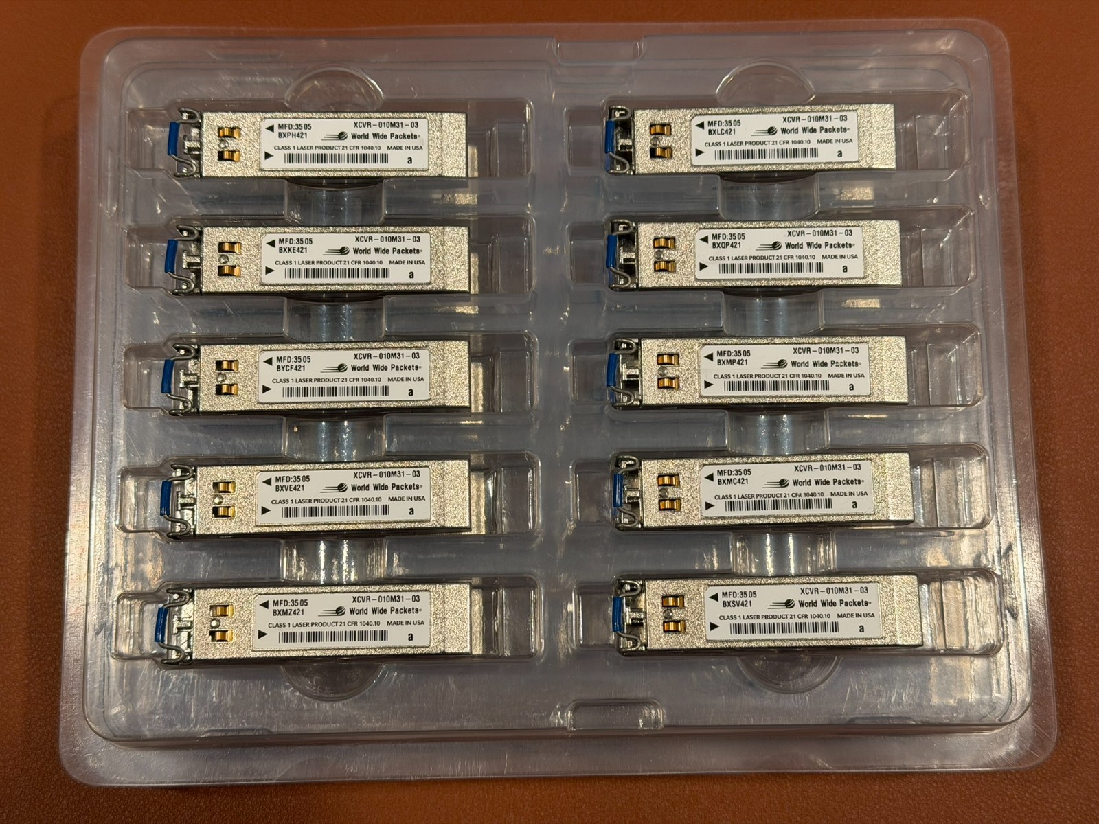 Lot of 47 World Wide Packets XCVR-010M32 Optical Transceivers – Used