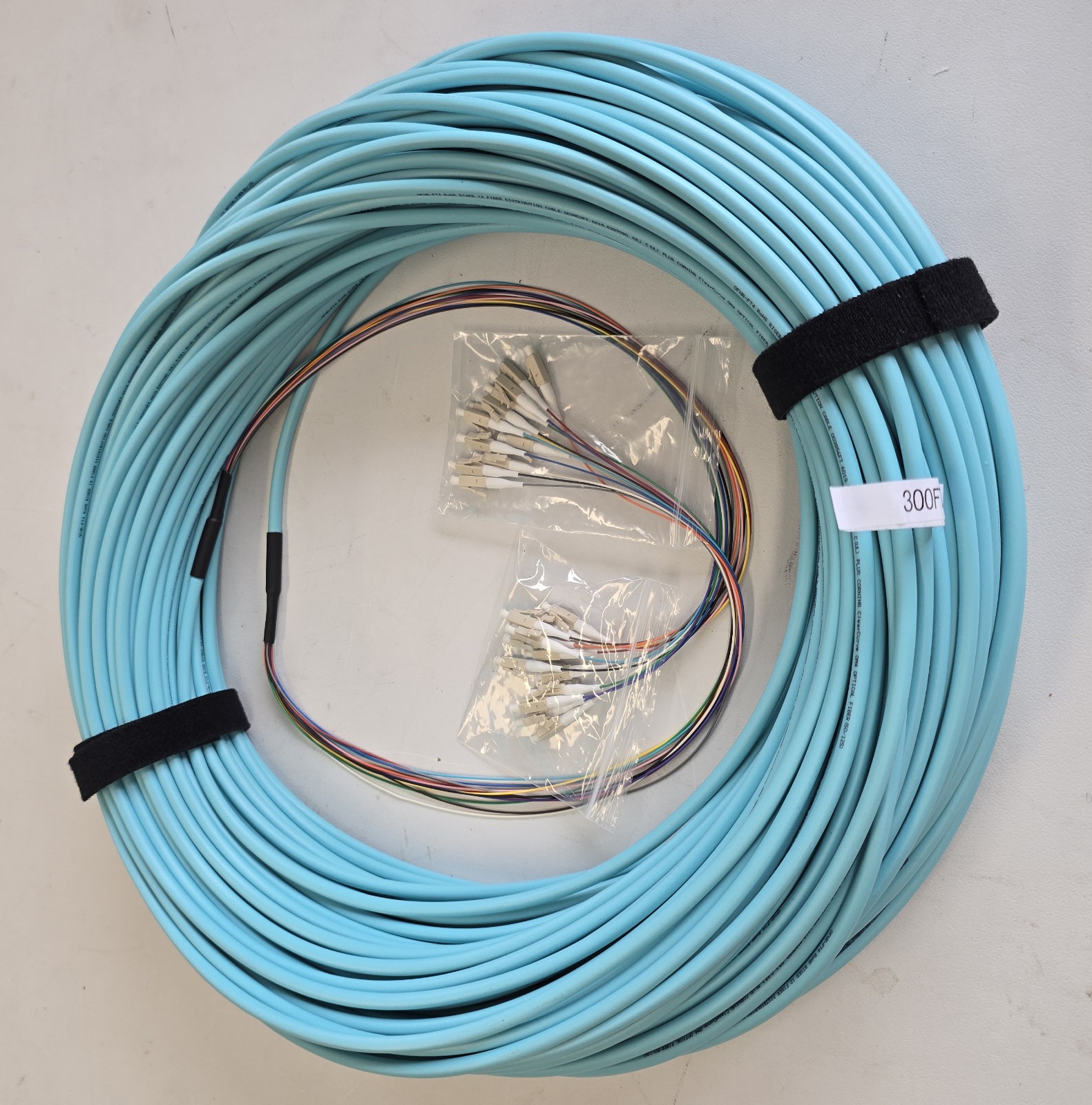 LC-LC 50/125 OM4 12 Fiber (Corning) Distribution PVC 300ft w/ 18″ 900um Fanout