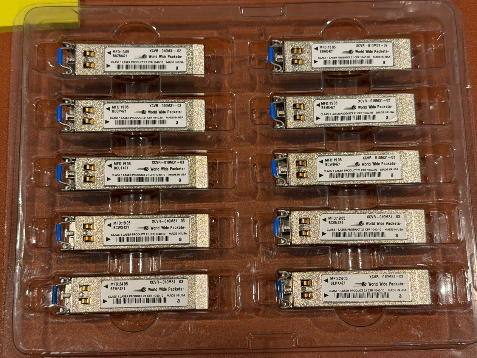 Lot of 47 World Wide Packets XCVR-010M32 Optical Transceivers – Used