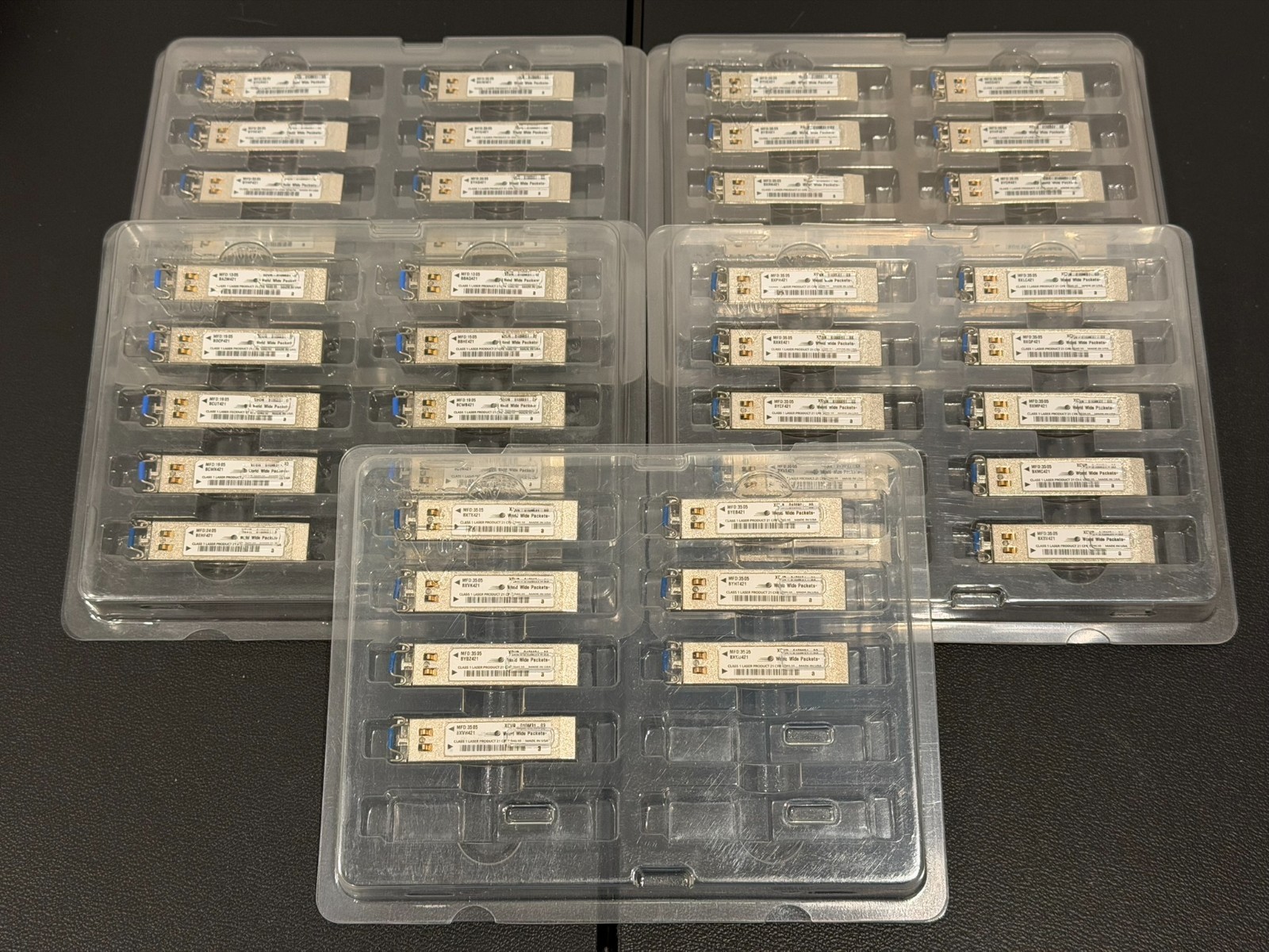 Lot of 47 World Wide Packets XCVR-010M32 Optical Transceivers – Used