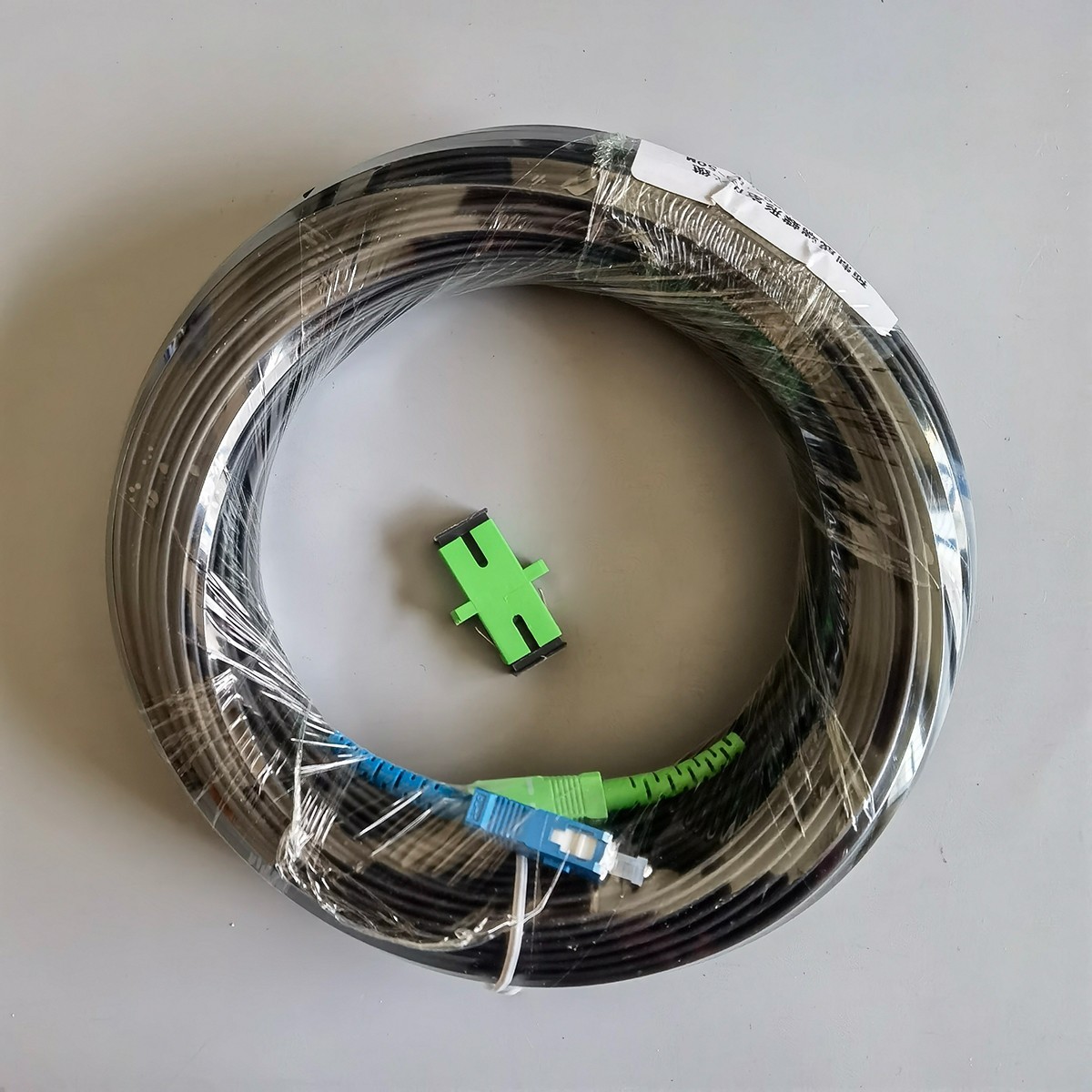 10M-50M Indoor Fiber Optic Drop Cable Single-Core Black SC/APC To SC/UPC
