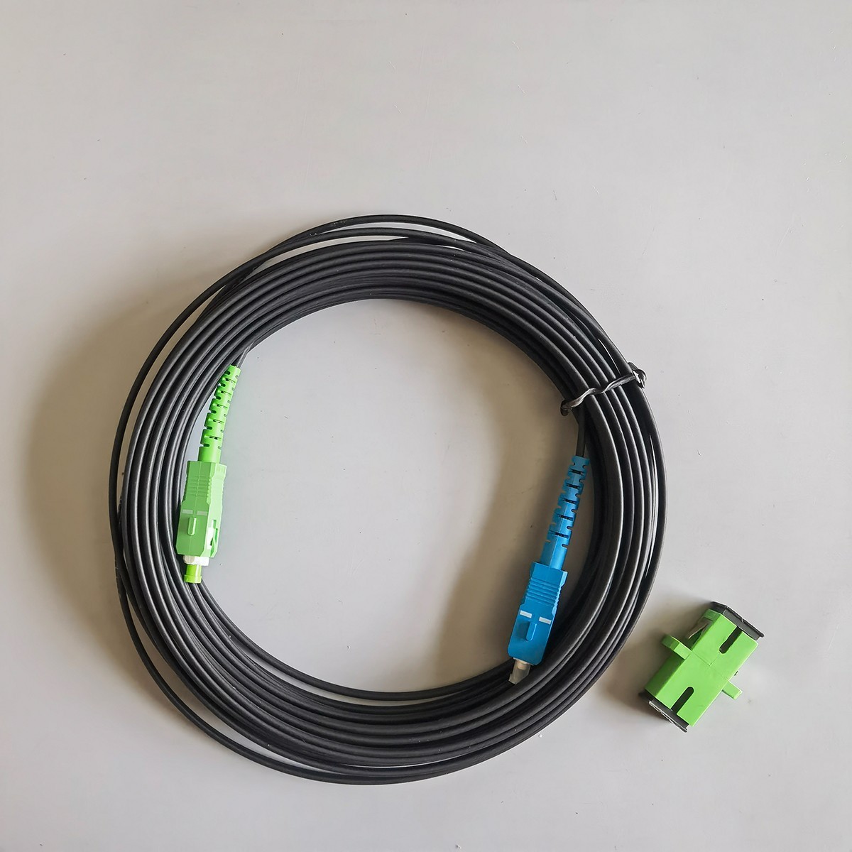 10M-50M Indoor Fiber Optic Drop Cable Single-Core Black SC/APC To SC/UPC