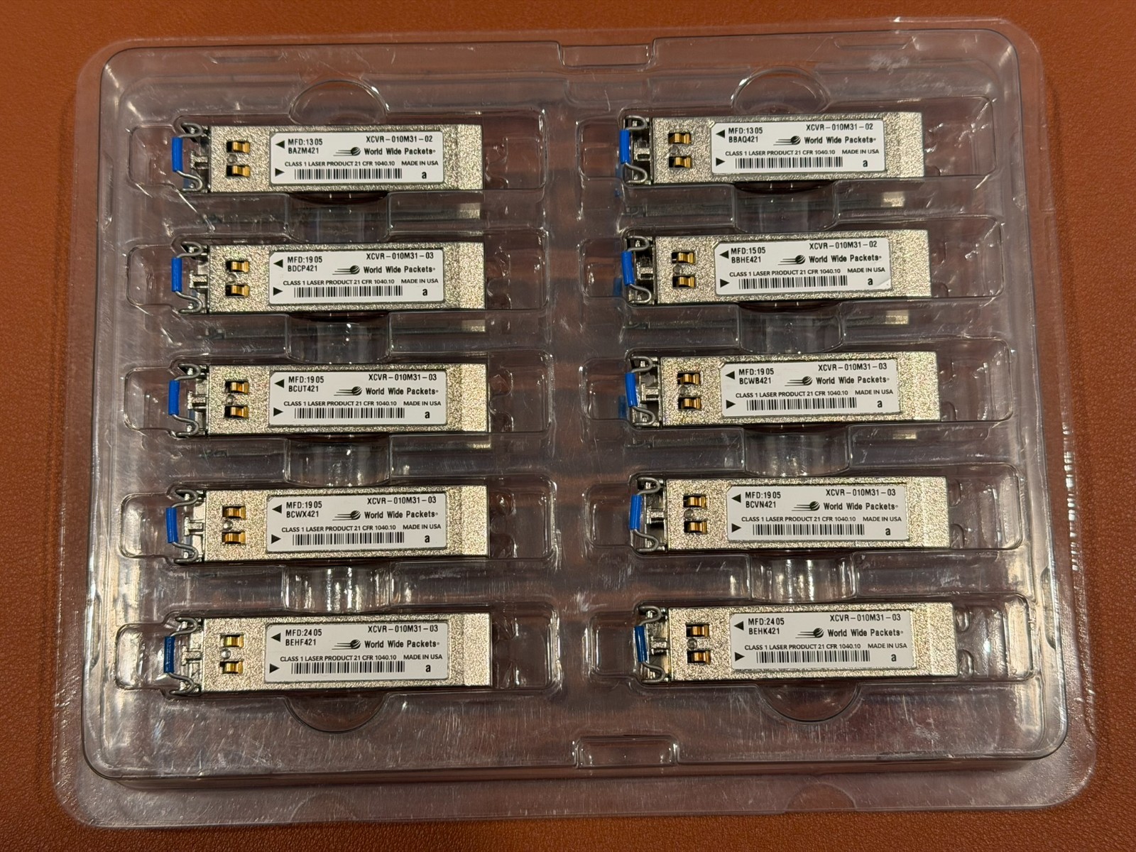 Lot of 47 World Wide Packets XCVR-010M32 Optical Transceivers – Used