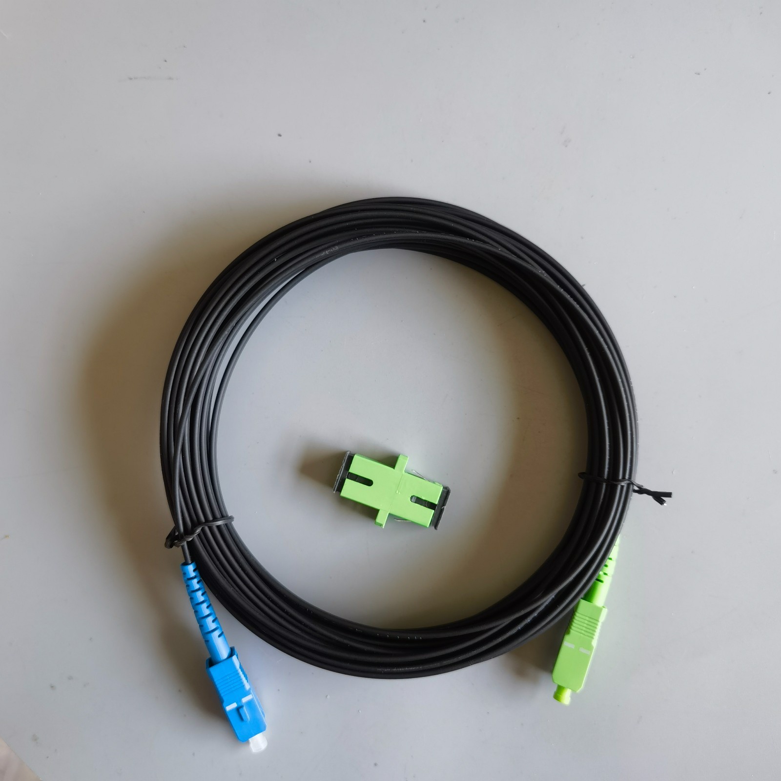 10M-50M Indoor Fiber Optic Drop Cable Single-Core Black SC/APC To SC/UPC