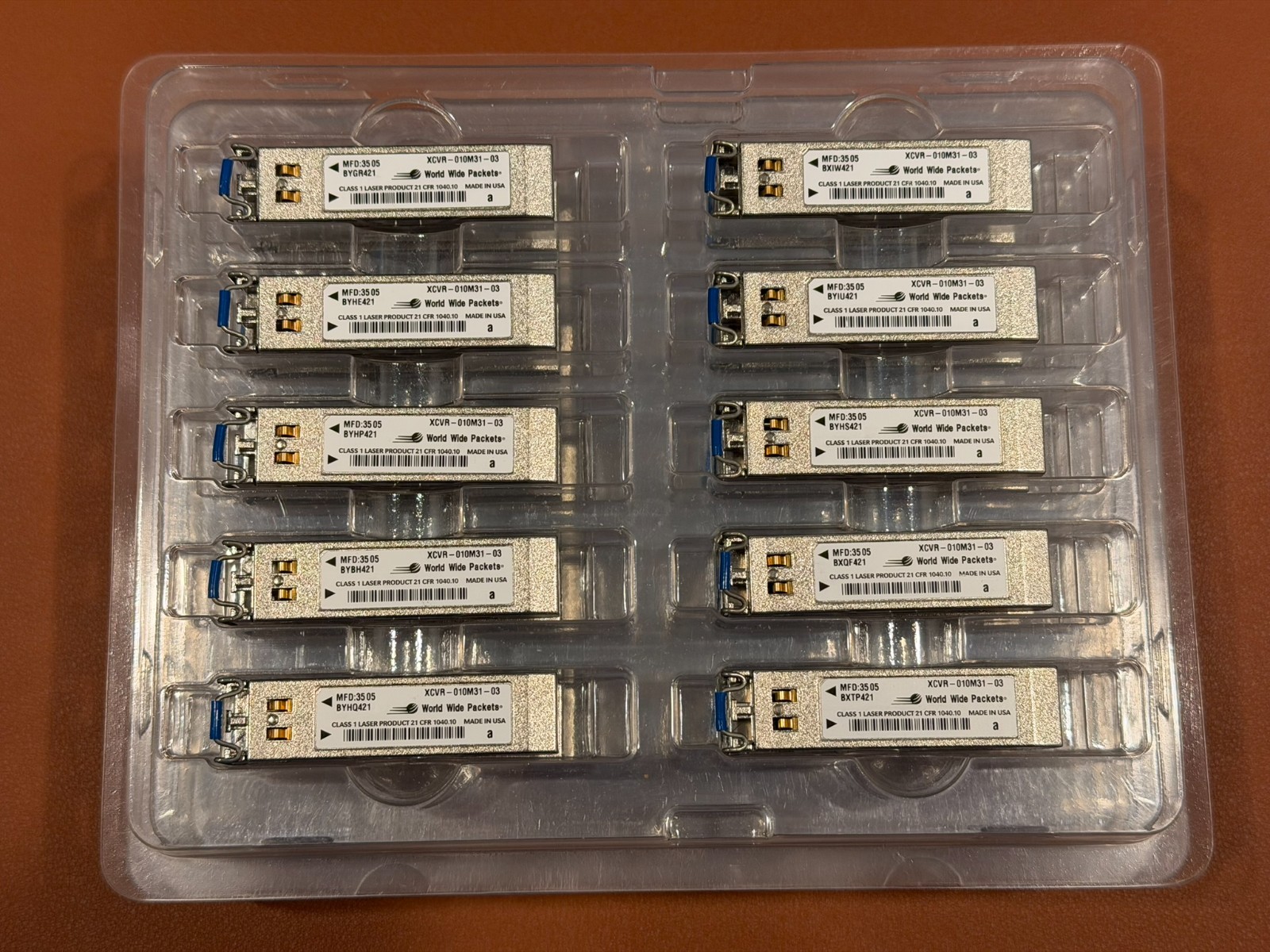 Lot of 47 World Wide Packets XCVR-010M32 Optical Transceivers – Used