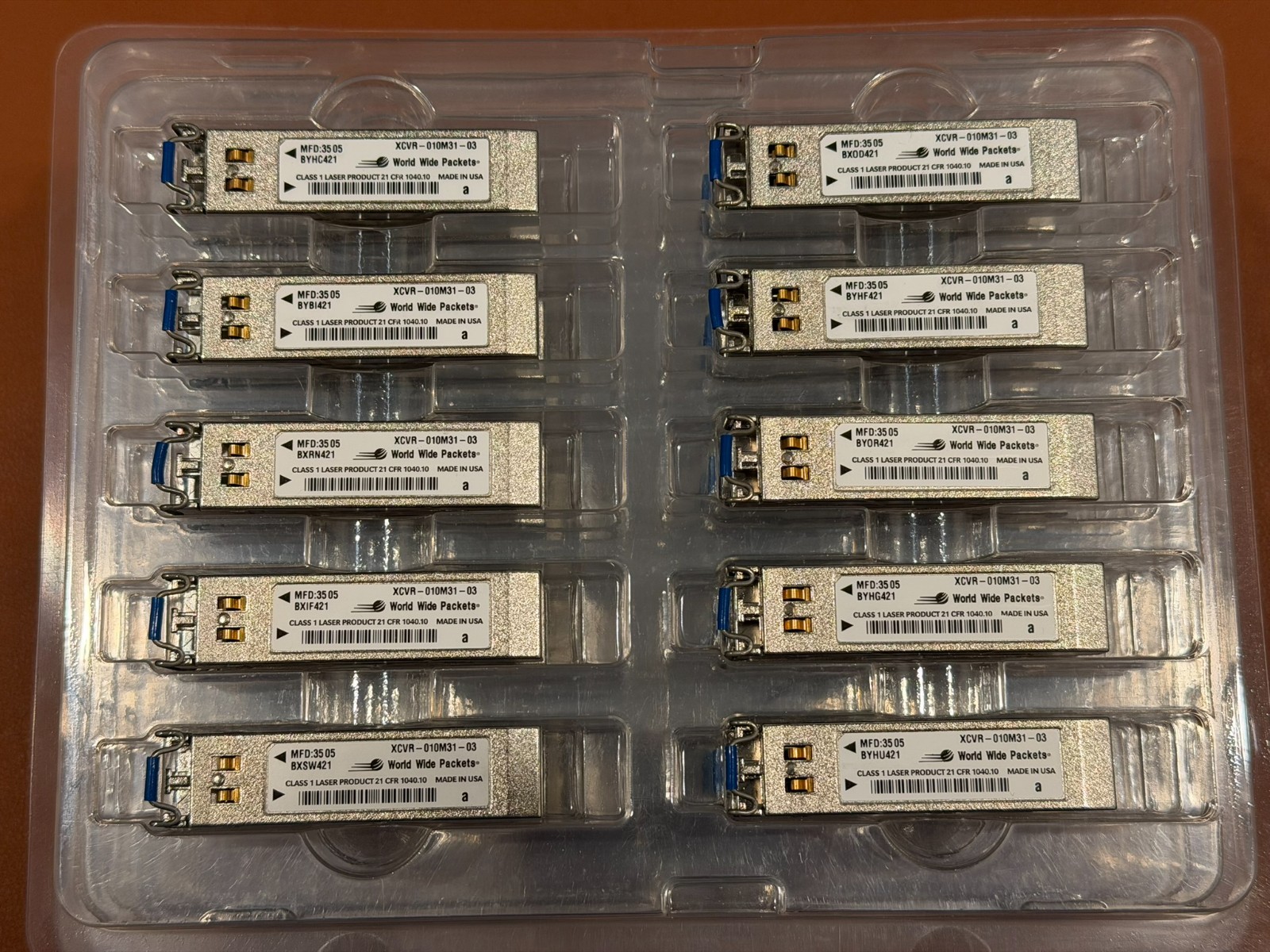 Lot of 47 World Wide Packets XCVR-010M32 Optical Transceivers – Used