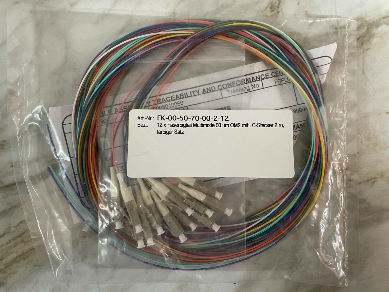 12 Optic Fiber Pigtail, Color-Coded, MMF OM2, LC/UPC, 900um, 2 Meter, Unjacketed