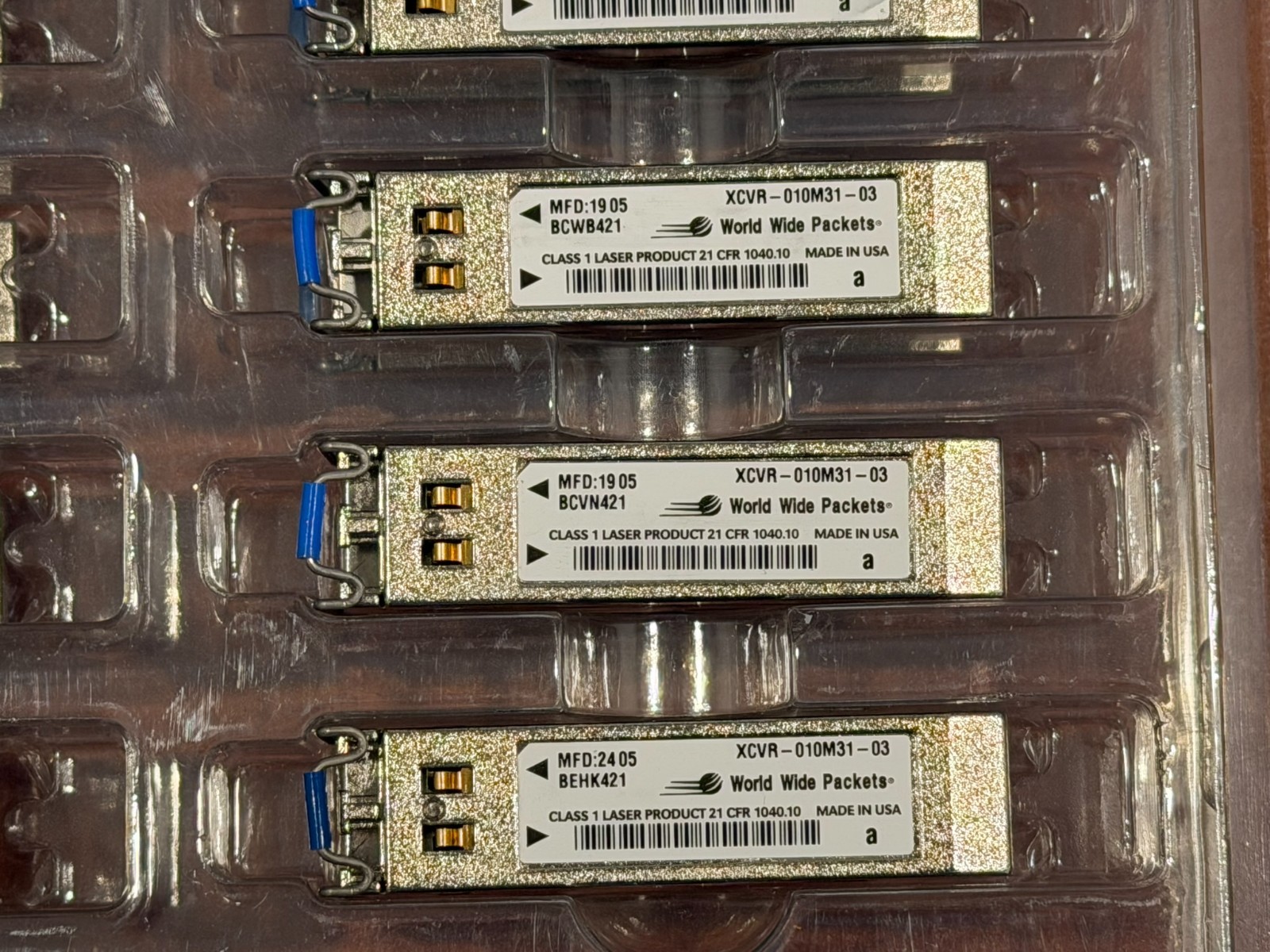 Lot of 47 World Wide Packets XCVR-010M32 Optical Transceivers – Used